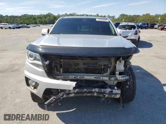 2016 Chevrolet Colorado 4WD Z71 with VIN 1GCGTDE33G1170065, listed as a Copart auction lot 55920665 with 135,410 mi miles and Salvage title. Bid and sale history available at DreamBid. Image 5.