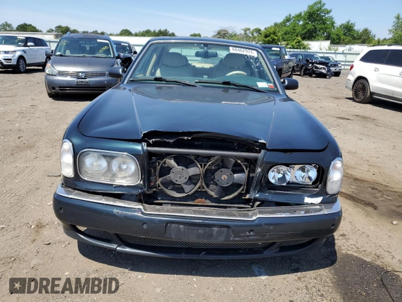 2001 Bentley Arnage with VIN SCBLC31E31CX05992, listed as a Copart auction lot 60462974 with 253,028 mi miles and Salvage Title. Bid and sale history available at DreamBid. Image 5.