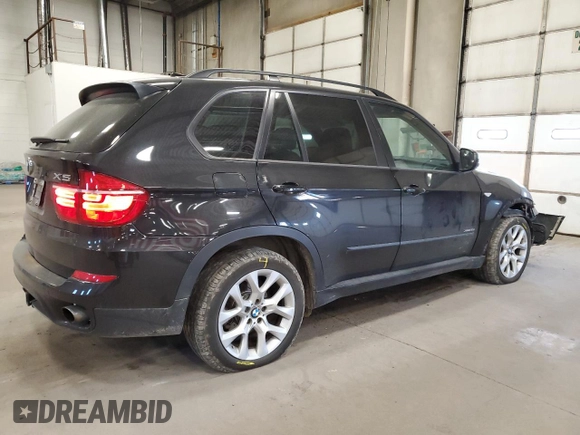 2011 BMW X5 35i z VIN 5UXZV4C52BL743475, wystawiony jako Copart lot #56238615 z przebiegiem 218 738 mil mil oraz Szkoda całkowita • Salvage title. Historia ofert i sprzedaży dostępna na DreamBid. Obrazek 3.