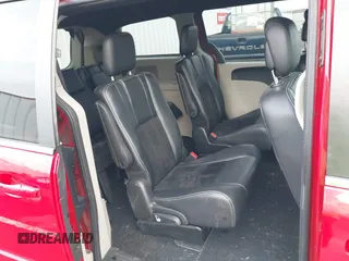 2014 Dodge Grand Caravan SXT with VIN 2C4RDGCG3ER257695, listed as a IAAI auction lot 41534568 with 116,896 mi miles and . Bid and sale history available at DreamBid. Image 8.