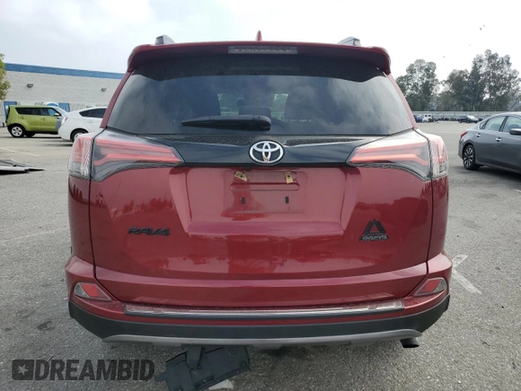 2018 Toyota RAV4 XLE with VIN 2T3WFREV0JW411011, listed as a Copart auction lot 58505825 with 91,787 mi miles and Salvage title. Bid and sale history available at DreamBid. Image 6.