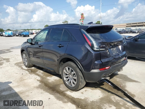 2022 Cadillac XT4 FWD Sport with VIN 1GYFZER46NF119009, listed as a Copart auction lot 57651725 with 37,896 mi miles and Salvage title. Bid and sale history available at DreamBid. Image 2.