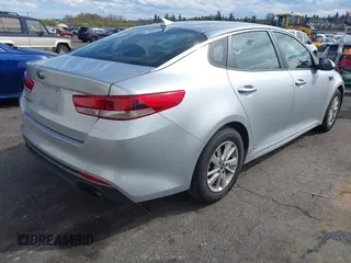 2017 Kia Optima LX with VIN 5XXGT4L39HG148760, listed as a IAAI auction lot 41889329 with 140,834 mi miles and . Bid and sale history available at DreamBid. Image 4.