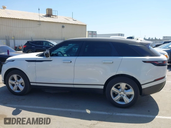 2021 Land Rover Range Rover Velar S z VIN SALYJ2EX7MA311922, wystawiony jako IAAI lot #42397827 z przebiegiem 40 514 mil mil oraz . Historia ofert i sprzedaży dostępna na DreamBid. Obrazek 14.