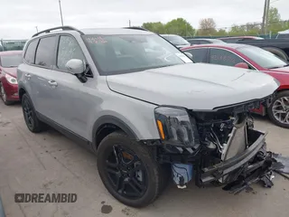 2024 Kia Telluride EX X-Line z VIN 5XYP3DGC0RG501992, wystawiony jako IAAI lot #42199896 z przebiegiem 11 727 mil mil oraz . Historia ofert i sprzedaży dostępna na DreamBid. Obrazek 1.