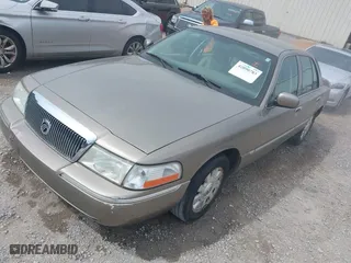 2005 Mercury Grand Marquis LS Premium with VIN 2MEFM75W35X654244, listed as a IAAI auction lot 42090783 with 120,033 mi miles. Bid and sale history available at carsss.com. Image 2.