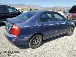 2004 Kia Spectra LX with VIN KNAFE122845046827, listed as a Copart auction lot 52262575 with 91,786 mi miles and Clean Title. Bid and sale history available at carsss.com. Image 3.