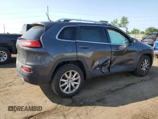 2014 Jeep Cherokee Limited with VIN 1C4PJMDB2EW215897, listed as a Copart auction lot 59576765 with 107,071 mi miles and Salvage title. Bid and sale history available at DreamBid. Image 3.