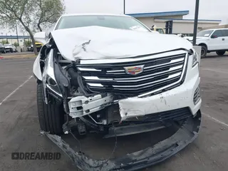 2019 Cadillac XT5 Luxury FWD with VIN 1GYKNCRS2KZ158560, listed as a IAAI auction lot 42067397 with 48,816 mi miles and . Bid and sale history available at DreamBid. Image 6.