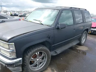 1999 Chevrolet Tahoe Z71 with VIN 1GNEK13R1XJ425996, listed as a IAAI auction lot 41798943 with 203,106 mi miles and . Bid and sale history available at DreamBid. Image 2.
