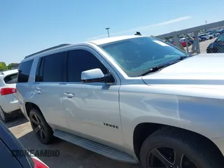 2015 Chevrolet Tahoe LT with VIN 1GNSCBKC9FR111001, listed as a IAAI auction lot 42440624 with 128,087 mi miles and . Bid and sale history available at DreamBid. Image 12.