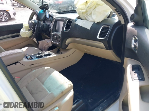 2014 Dodge Durango SXT with VIN 1C4RDHAG9EC313429, listed as a IAAI auction lot 42470331 with 182,635 mi miles and . Bid and sale history available at DreamBid. Image 5.