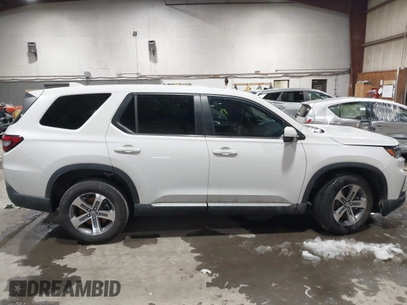 2025 Honda Pilot EX-L with VIN 5FNYG1H41SB045061, listed as a IAAI auction lot 41571217 with 7,971 mi miles and . Bid and sale history available at DreamBid. Image 13.