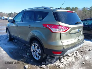2013 Ford Escape Titanium with VIN 1FMCU9J99DUD46870, listed as a IAAI auction lot 41614409 with 141,739 mi miles and . Bid and sale history available at DreamBid. Image 3.