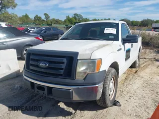2011 Ford F-150 XL with VIN 1FTNF1CF6BKE10822, listed as a IAAI auction lot 41443960 with 245,925 mi miles and . Bid and sale history available at DreamBid. Image 2.
