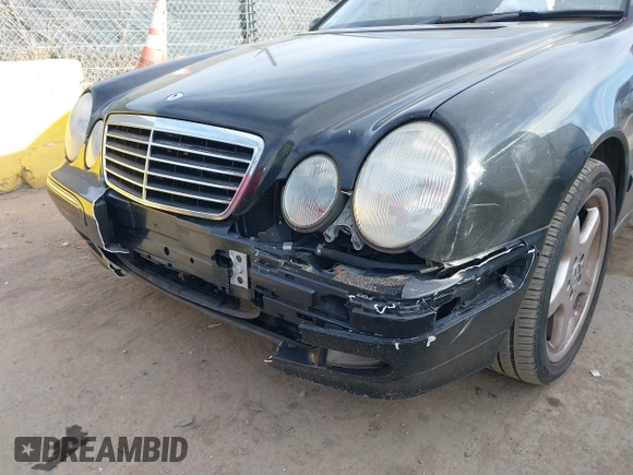 2001 Mercedes-Benz E-Class with VIN WDBJH65JX1B290284, listed as a IAAI auction lot 41713265 with 1 mi miles. Bid and sale history available at carsss.com. Image 6.
