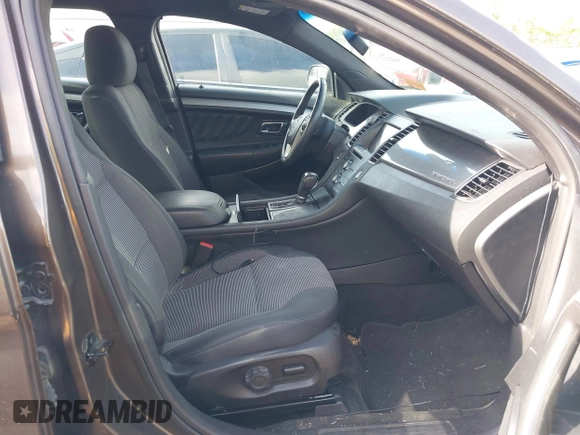 2015 Ford Taurus SEL with VIN 1FAHP2E87FG194170, listed as a IAAI auction lot 42184749 with 222,609 mi miles and . Bid and sale history available at carsss.com. Image 5.