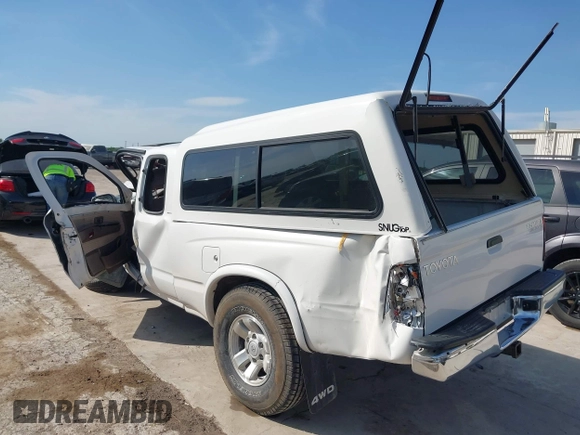 1999 Toyota Tacoma with VIN 4TAWN74N5XZ413494, listed as a IAAI auction lot 42254027 with Not provided miles and . Bid and sale history available at DreamBid. Image 3.