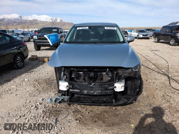2020 Mazda CX-5 Touring with VIN JM3KFBCMXL0767254, listed as a Copart auction lot 52189335 with 96,922 mi miles and Salvage Title. Bid and sale history available at carsss.com. Image 5.