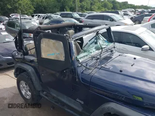 2006 Jeep Wrangler SE with VIN 1J4FA29156P739521, listed as a IAAI auction lot 42563566 with 117,281 mi miles and . Bid and sale history available at DreamBid. Image 6.