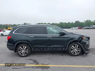 2017 Honda Pilot Touring with VIN 5FNYF6H93HB068846, listed as a IAAI auction lot 42083050 with 108,787 mi miles and . Bid and sale history available at DreamBid. Image 13.