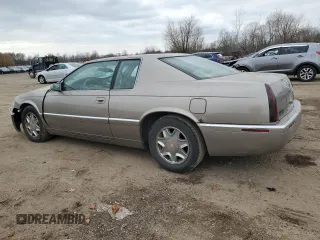 2000 Cadillac Eldorado with VIN 1G6EL12Y5YU166723, listed as a Copart auction lot 82612034 with 80,839 mi miles and Salvage title. Bid and sale history available at DreamBid. Image 2.