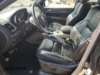 2019 Jeep Grand Cherokee Trailhawk with VIN 1C4RJFLT8KC726784, listed as a Copart auction lot 66010235 with 136,683 mi miles and Salvage title. Bid and sale history available at DreamBid. Image 7.