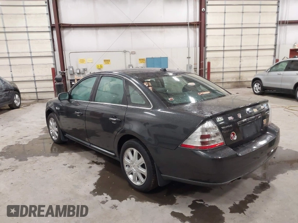 2008 Ford Taurus Limited with VIN 1FAHP28W08G141243, listed as a IAAI auction lot 41327967 with 157,482 mi miles. Bid and sale history available at carsss.com. Image 3.