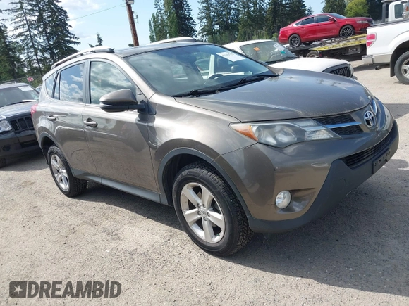 2013 Toyota RAV4 XLE with VIN JTMRFREV9DD024522, listed as a IAAI auction lot 42169755 with 164,493 mi miles and . Bid and sale history available at carsss.com. Image 1.