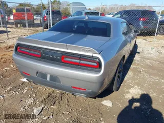 2016 Dodge Challenger SRT 392 with VIN 2C3CDZDJ5GH165903, listed as a IAAI auction lot 41281438 with 7,516 mi miles. Bid and sale history available at carsss.com. Image 4.