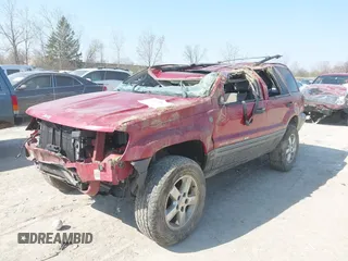 2004 Jeep Grand Cherokee Laredo z VIN 1J4GW48S34C289321, wystawiony jako IAAI lot #42062819 z przebiegiem Nie podano mil oraz . Historia ofert i sprzedaży dostępna na DreamBid. Obrazek 17.
