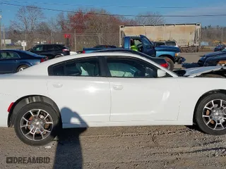2016 Dodge Charger SXT with VIN 2C3CDXJG4GH259669, listed as a IAAI auction lot 41805408 with 207,187 mi miles. Bid and sale history available at carsss.com. Image 14.