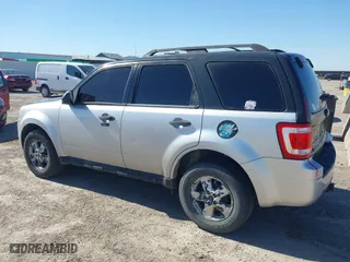 2010 Ford Escape XLT with VIN 1FMCU0DG3AKA09821, listed as a IAAI auction lot 41785754 with 208,875 mi miles. Bid and sale history available at carsss.com. Image 6.