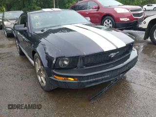 2005 Ford Mustang Deluxe z VIN 1ZVFT80N655234887, wystawiony jako IAAI lot #42521363 z przebiegiem 164 011 mil mil oraz . Historia ofert i sprzedaży dostępna na DreamBid. Obrazek 6.
