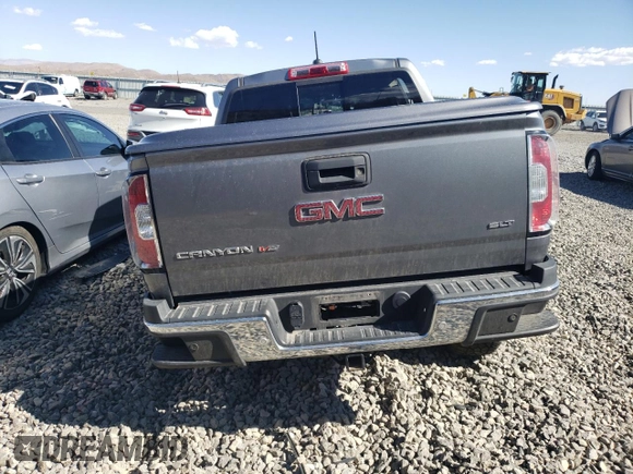 2020 GMC Canyon 4WD SLT with VIN 1GTG6DEN2L1248645, listed as a Copart auction lot 74919454 with 56,085 mi miles and Salvage Title. Bid and sale history available at carsss.com. Image 6.