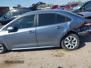 2023 Toyota Corolla LE z VIN 5YFB4MDE9PP004980, wystawiony jako IAAI lot #41788099 z przebiegiem 21 650 mil mil oraz . Historia ofert i sprzedaży dostępna na DreamBid. Obrazek 14.
