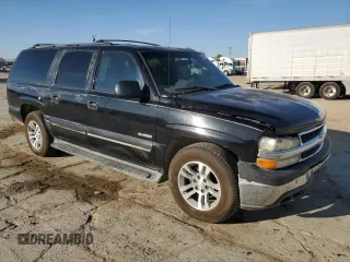 2000 Chevrolet Suburban LS with VIN 3GNEC16T6YG141156, listed as a Copart auction lot 75569064 with 246,247 mi miles and Salvage title. Bid and sale history available at DreamBid. Image 4.