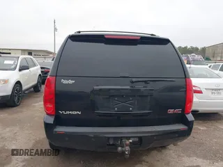 2014 GMC Yukon SLT with VIN 1GKS1CE02ER207447, listed as a IAAI auction lot 41604134 with 199,417 mi miles. Bid and sale history available at carsss.com. Image 16.