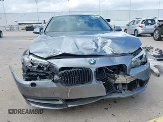 2014 BMW 5 Series 528i with VIN WBA5A5C52ED500696, listed as a IAAI auction lot 41708462 with 121,592 mi miles. Bid and sale history available at carsss.com. Image 12.