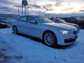 2014 BMW 7 Series 740Li xDrive with VIN WBAYF4C57ED281954, listed as a Copart auction lot 85297394 with 63,535 mi miles and Salvage Title. Bid and sale history available at carsss.com. Image 4.