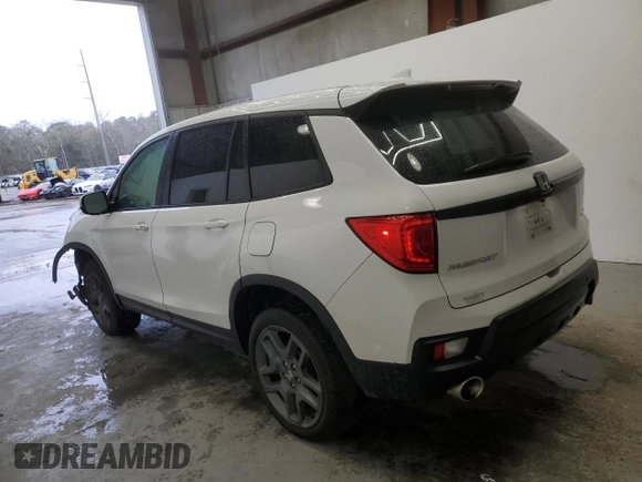 2023 Honda Passport EX-L with VIN 5FNYF8H56PB008485, listed as a Copart auction lot 47852225 with 52,543 mi miles and Salvage Title. Bid and sale history available at carsss.com. Image 2.