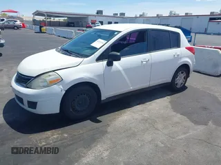 2011 Nissan Versa 1.8 S with VIN 3N1BC1CP0BL452473, listed as a IAAI auction lot 42171311 with 167,018 mi miles. Bid and sale history available at carsss.com. Image 2.
