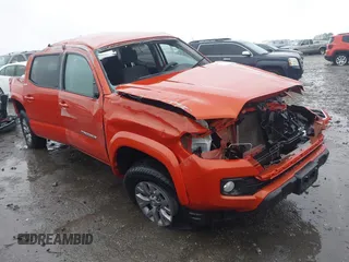 2017 Toyota Tacoma SR5 with VIN 5TFDZ5BN0HX015629, listed as a IAAI auction lot 42002103 with 127,829 mi miles. Bid and sale history available at carsss.com. Image 1.
