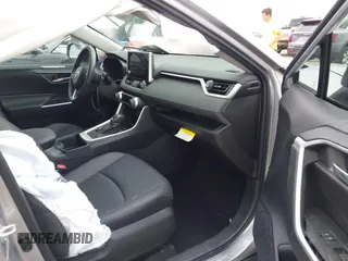 2023 Toyota RAV4 Hybrid XLE Premium z VIN 4T3B6RFV2PU138031, wystawiony jako IAAI lot #42127990 z przebiegiem 14 191 mil mil oraz . Historia ofert i sprzedaży dostępna na DreamBid. Obrazek 5.