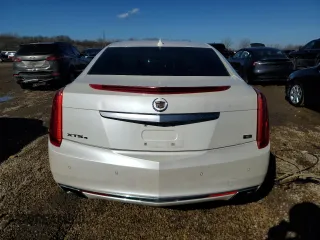 2013 Cadillac XTS Platinum z VIN 2G61V5S33D9235209, wystawiony jako Copart lot #46158375 z przebiegiem 178 848 mil mil oraz Szkody całkowita. Historia ofert i sprzedaży dostępna na DreamBid. Obrazek 6.