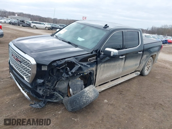 2020 GMC Sierra 1500 Denali with VIN 3GTU9FED5LG249125, listed as a IAAI auction lot 41839861 with 99,826 mi miles and . Bid and sale history available at DreamBid. Image 2.