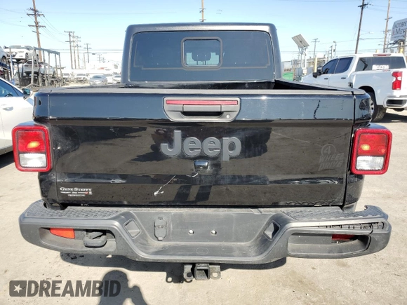 2021 Jeep Gladiator Willys with VIN 1C6HJTAG8ML563161, listed as a Copart auction lot 52734195 with 48,521 mi miles and Salvage title. Bid and sale history available at DreamBid. Image 6.