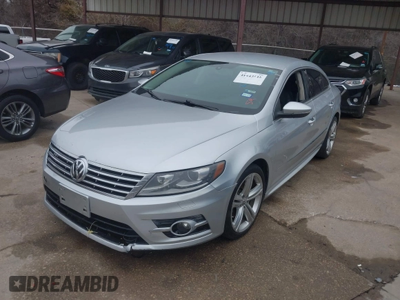 2014 Volkswagen CC Sport with VIN WVWBN7ANXEE501758, listed as a IAAI auction lot 41443518 with 193,259 mi miles and . Bid and sale history available at DreamBid. Image 2.