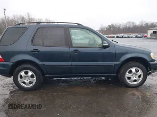 2003 Mercedes-Benz M-Class 3.2L with VIN 4JGAB54EX3A390987, listed as a IAAI auction lot 41482335 with 191,381 mi miles. Bid and sale history available at carsss.com. Image 13.