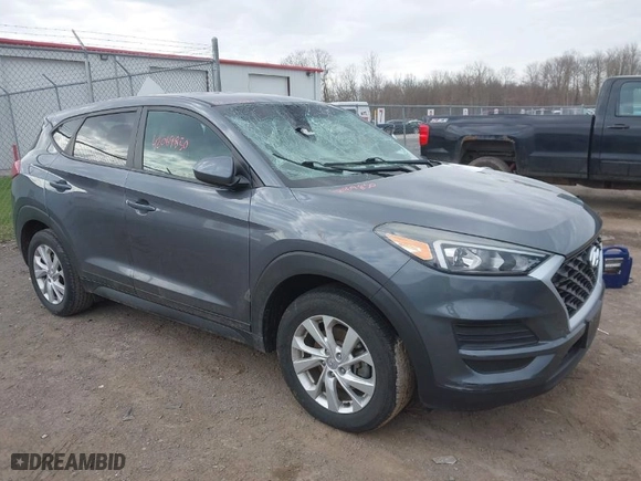 2019 Hyundai Tucson SE with VIN KM8J23A48KU923772, listed as a IAAI auction lot 42069850 with 57,692 mi miles. Bid and sale history available at carsss.com. Image 1.